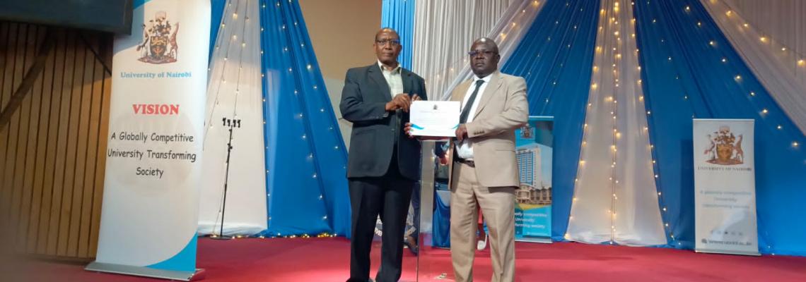 Prof. Ngaruiya and Dr. Peter Mulwa during the Staff Recognition Awards Ceremony 2026
